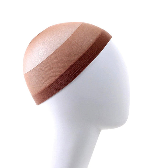 Gray and brown stretch nylon wig caps fitted on a mannequin head, the breathable base stylists use under a full wig