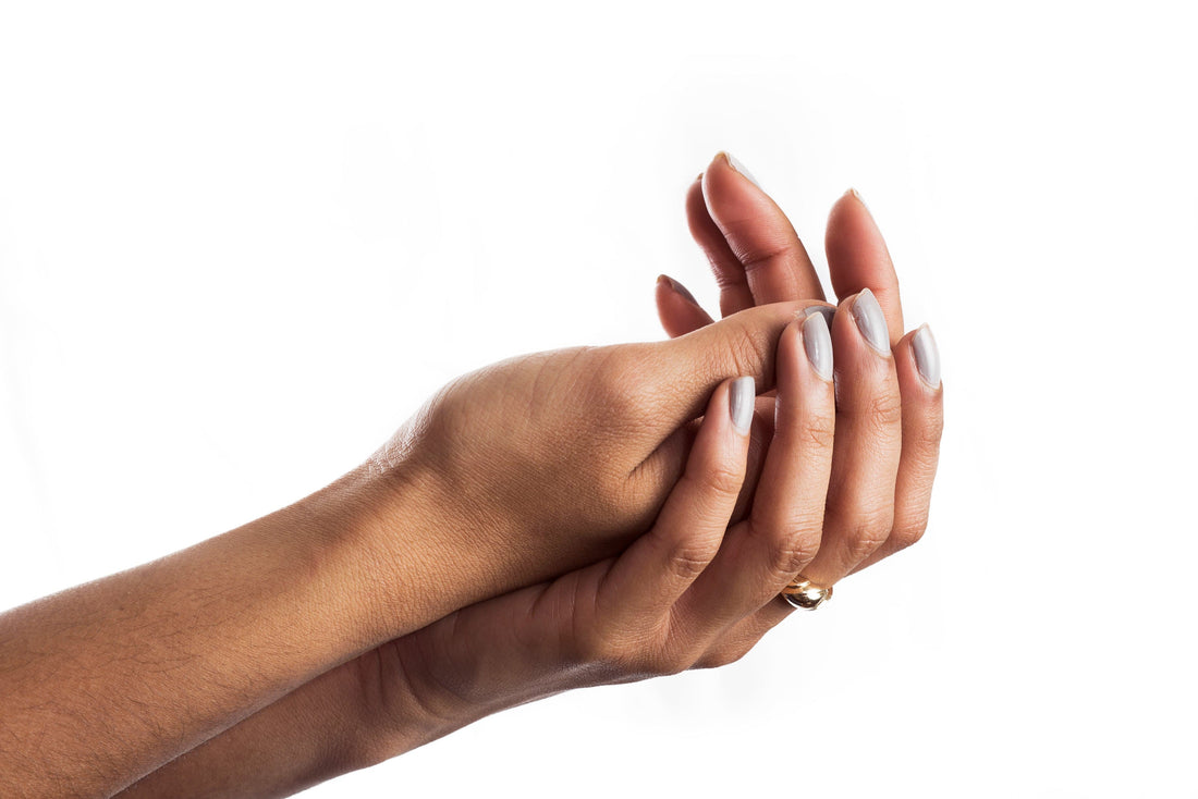 Manicured hands, the result of proper cuticle nipper, clipper, and pusher technique