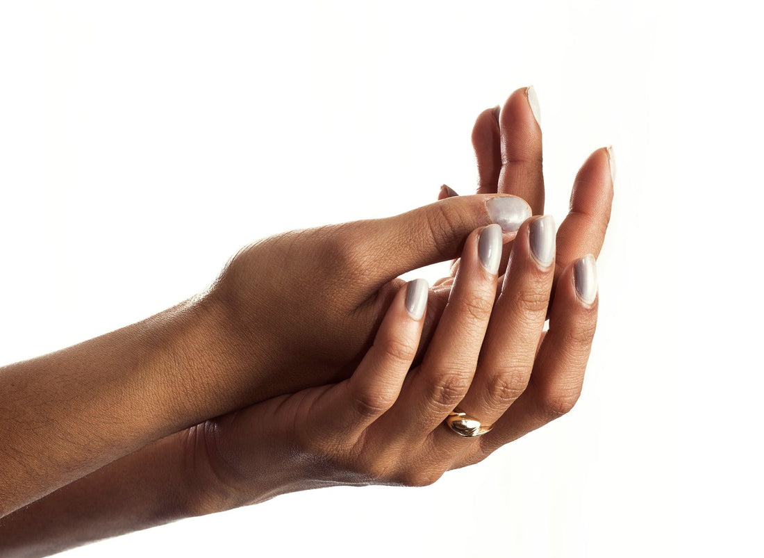 Glossy gel manicure on natural nails, an example of gel polish done at home correctly